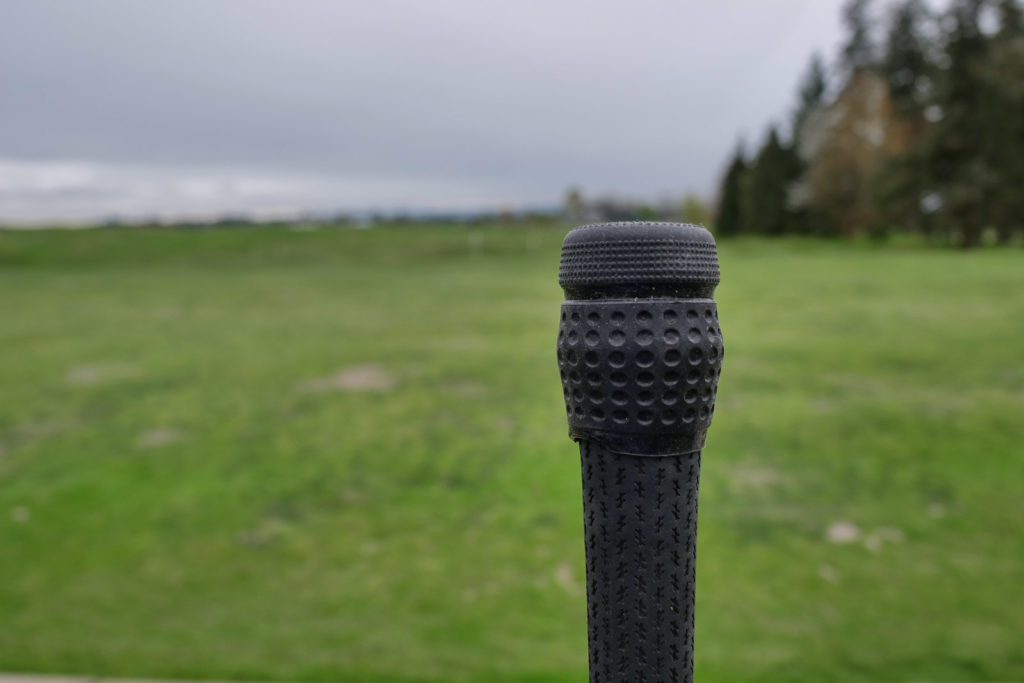 The Blast Motion club attachment and sensor on a regular iron.